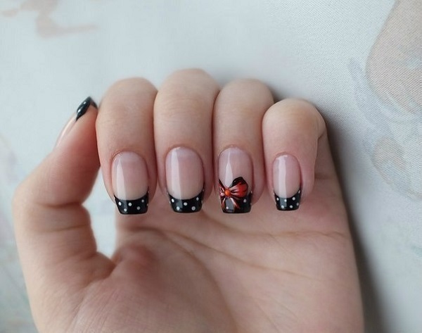 lace and bow nail art. What better way to design your super long nails 