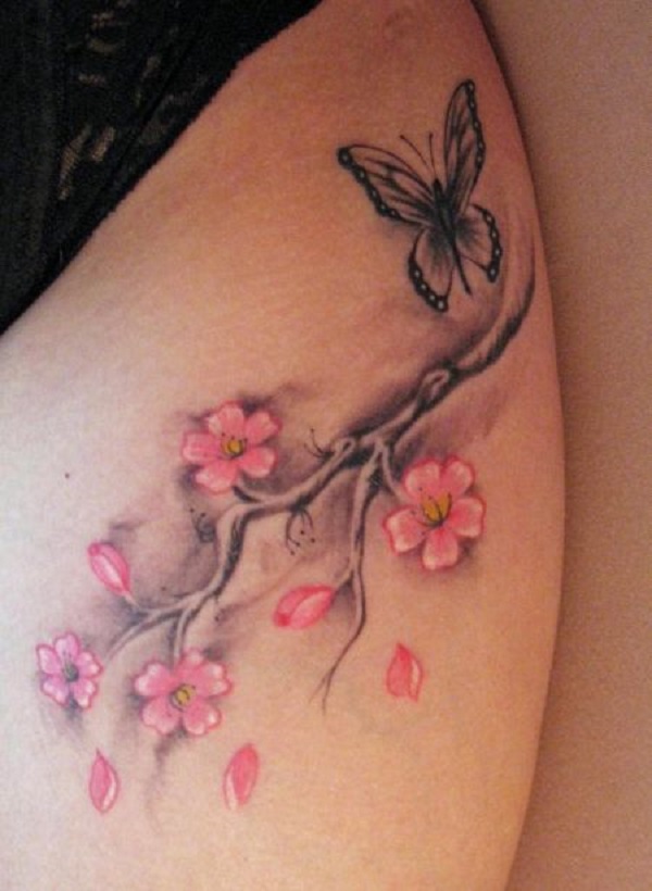 Simple and cute cherry blossom tattoo with a butterfly. This almost 