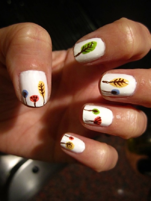 very cute leaf nail art design. Coat your nails with plain white 
