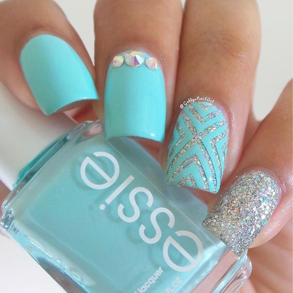 Sky blue and silver glitter spring nail art design. There’s nothing more spring inspired look than the brightly colored polish similar as the sky. The silver glitter polish also adds sparkle to the design.