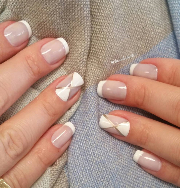 White and sheer French tips for the spring. If you want to don the classic French tip but still stand out then this design is perfect for you. Give your nails the makeover it deserves.