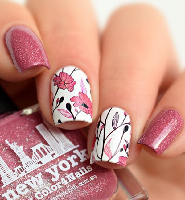 Another pretty in pink spring nail art design. Using white polis as base color as well as pink sheer color with glitters, your nails will look absolutely gorgeous. Add pretty flower details on top and everything is perfect.