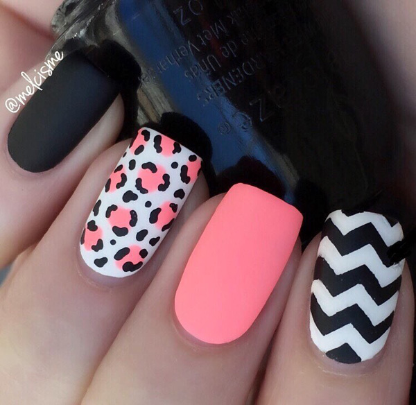Pink, black and white spring nail art design combination. Bring out the vogue in you this spring with these matte, zigzag and animal print designed nail art.