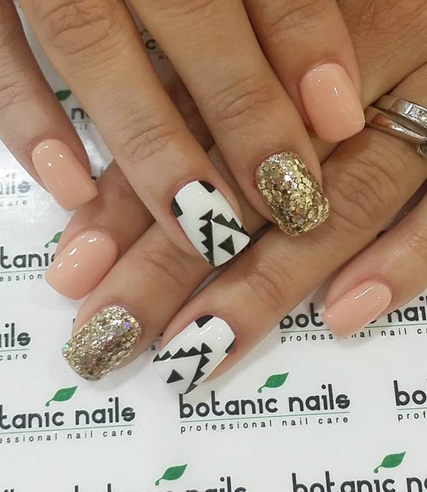 Stunning nude, gold, black and white spring nail art ensemble. Gives your nails a truly smashing look by making them uniquely designed from one nail to another.