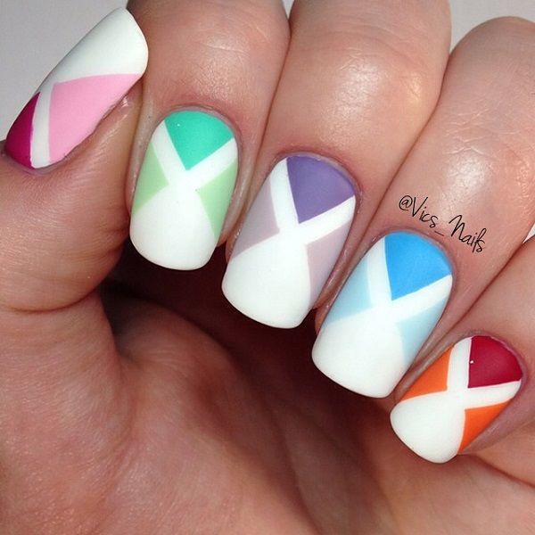 Multi colored x-shaped spring nail art design. This is a nail art design that is truly impressive when it comes to color hues. Simple and very interesting to look at you can recreate this on your own nails in no time.