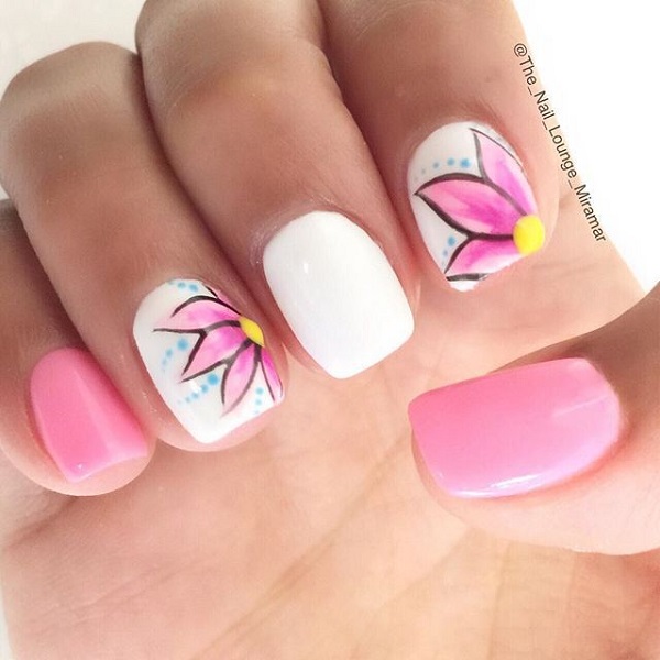 A really pretty pink flower inspired spring nail art design. Nothing beats the fresh look of the summer and the pink and white color combination is simply perfect for the season.