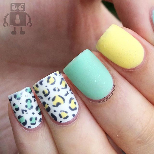 Pastel inspired leopard nail art design. The light pastel colors used in the design adds to the overall cuteness of the look. Very easy on the eyes and simple to do.