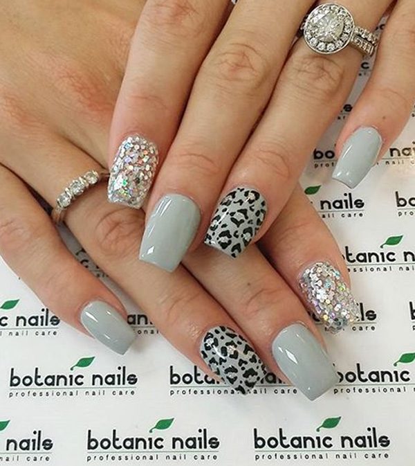 Gray themed leopard nail art design. Subtle, very laid back and cool looking design. The embellishments added on top of the layers of nail polish also proved as a great accessory to the design.