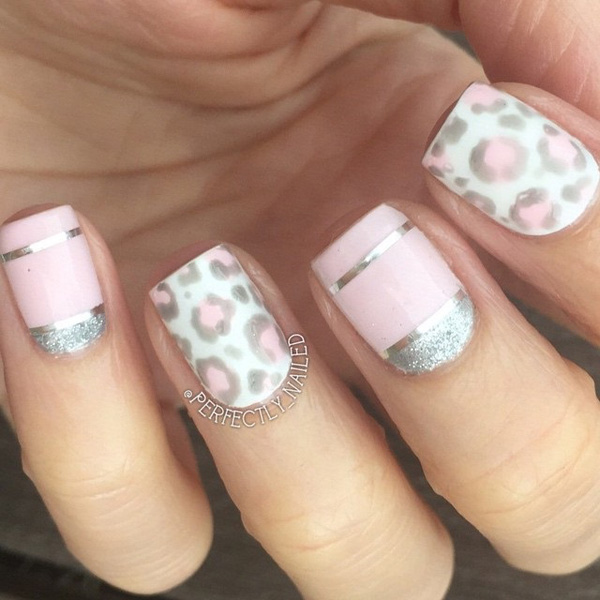 A very pretty in pink leopard nail art design. A very light pink polish was used in his design in addition to silver dust and silver metallic paper that defined the mini French tips the design has.