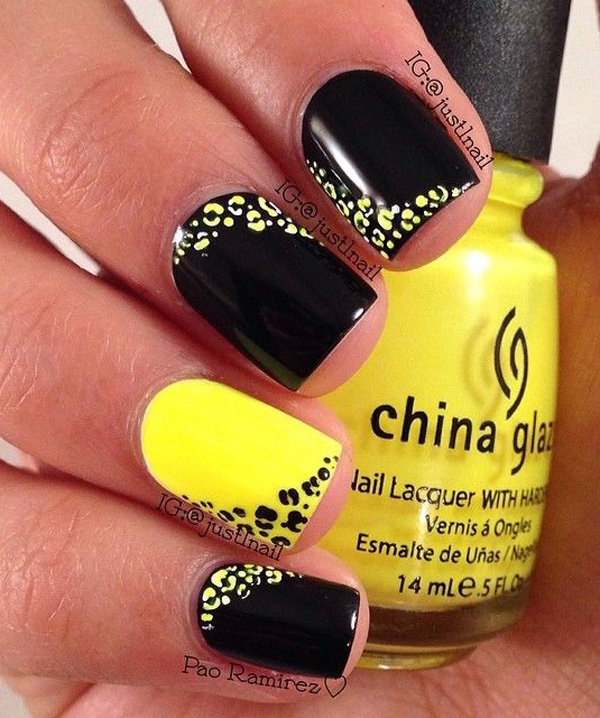 Yellow and black leopard nail art design. The leopard prints are artistically positioned all over the nails creating a fun looking effect on the alternating nails with alternating colors as well.