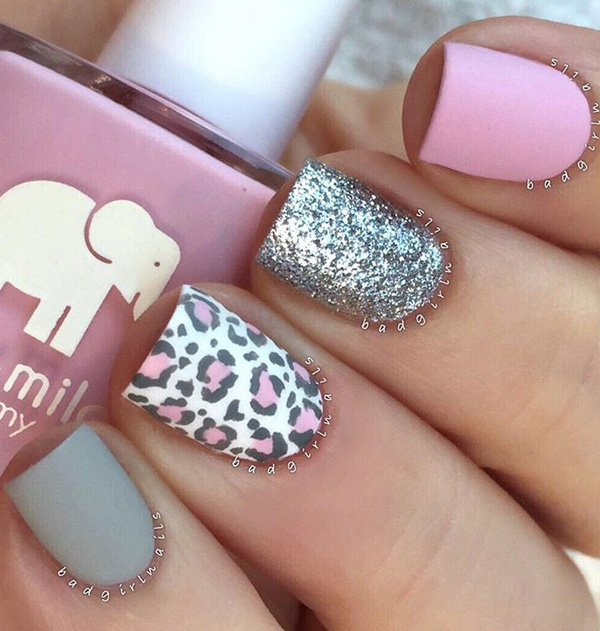 Cute looking leopard nail art design in pink and blue gray.  This is a wonderful design for short nails as they can look cute and clean at the same time. The silver glitter polish also helps make the design more eye catching.