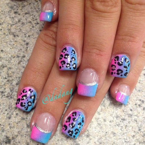 Pink and blue colored leopard nail art design. The gradient effects on the pink and blue colors look amazing as they form a periwinkle hue. The contrasting leopard prints are also pleasantly noticeable.