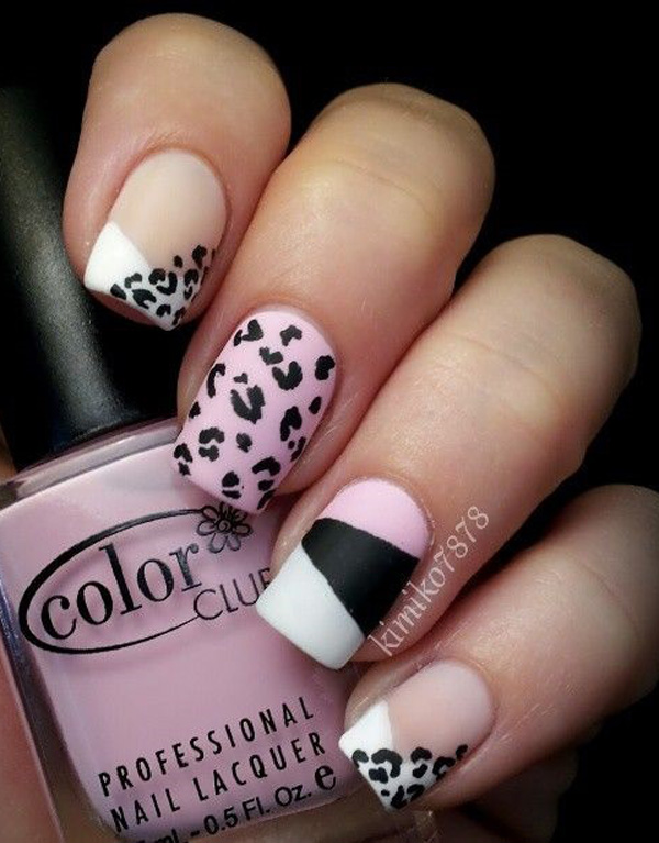 Black and white inspired leopard nail art design. This black and white combination also sports a bit of pastel pink into the roster and they all blend well to form a unique French tip of leopard prints.