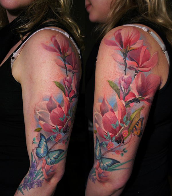 Magnolia sleeve tattoo with a butterfly for women