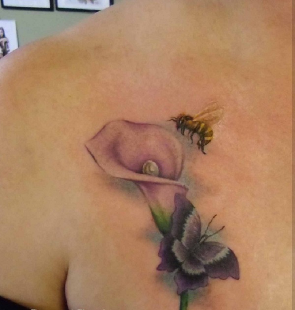 Butterfly with calla lily and a flying bee tattoo