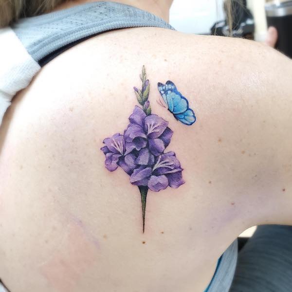 Butterfly and gladiolus tattoo