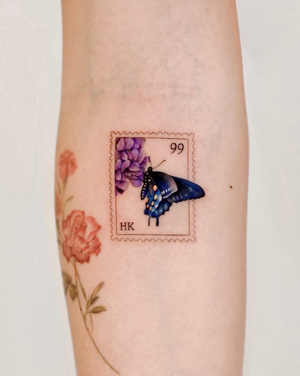 Butterfly and wisteria stamp tattoo