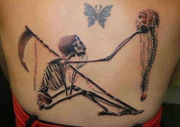 grim reaper scythe and lamp tattoo