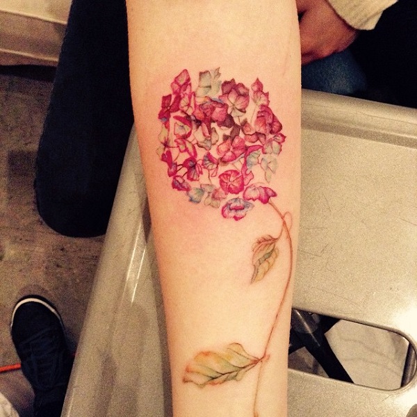 Small hydrangea tattoo on the left thigh  Tattoogridnet