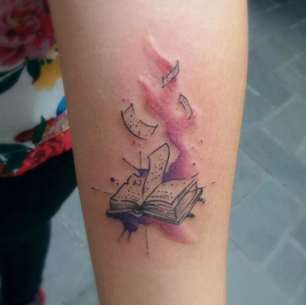 flying books tattoo