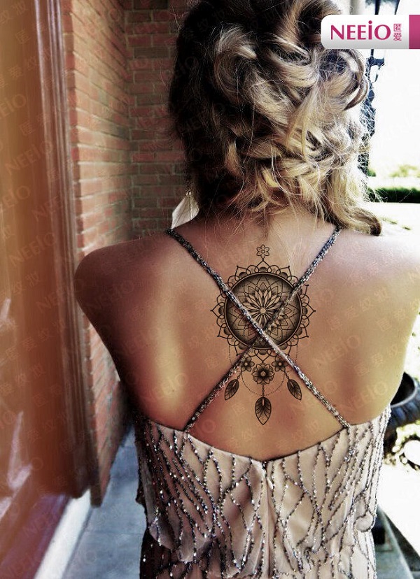 Dream catcher  rose tattoo on the upper back