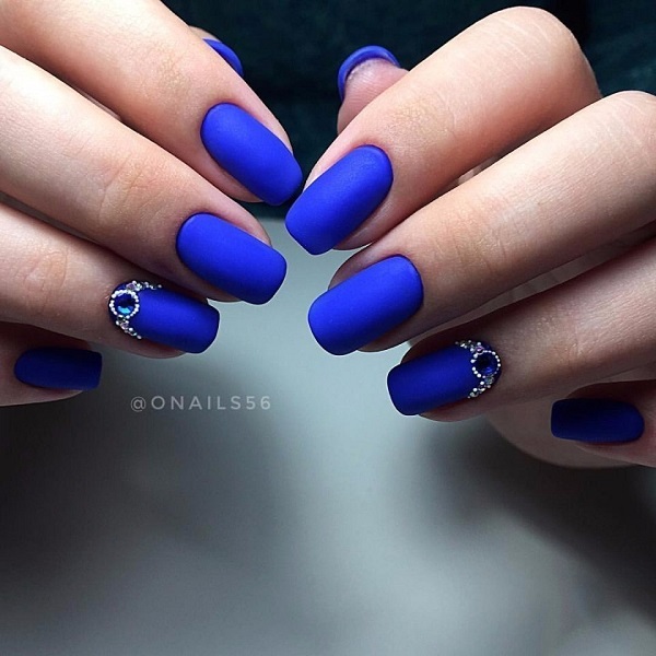 royal blue nails with rhinestones