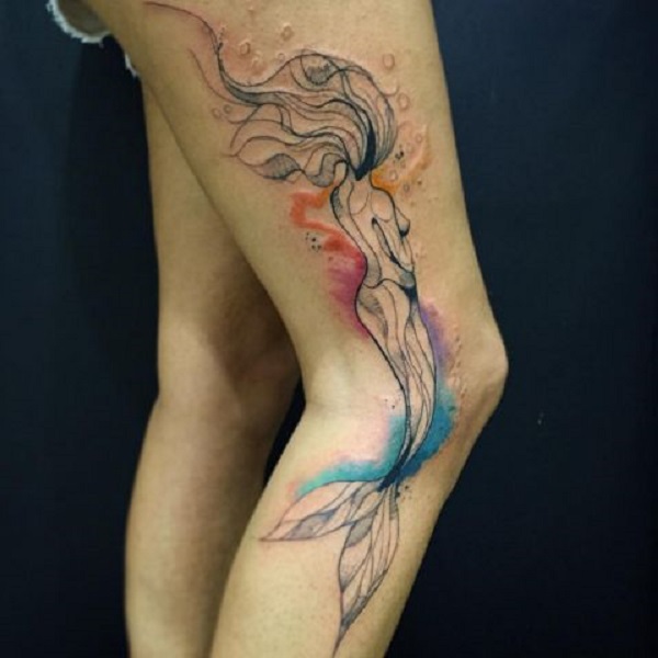 Small watercolor style tattoo of the little mermaid on