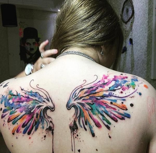 35 Meaningful Angel wings tattoos - nenuno creative